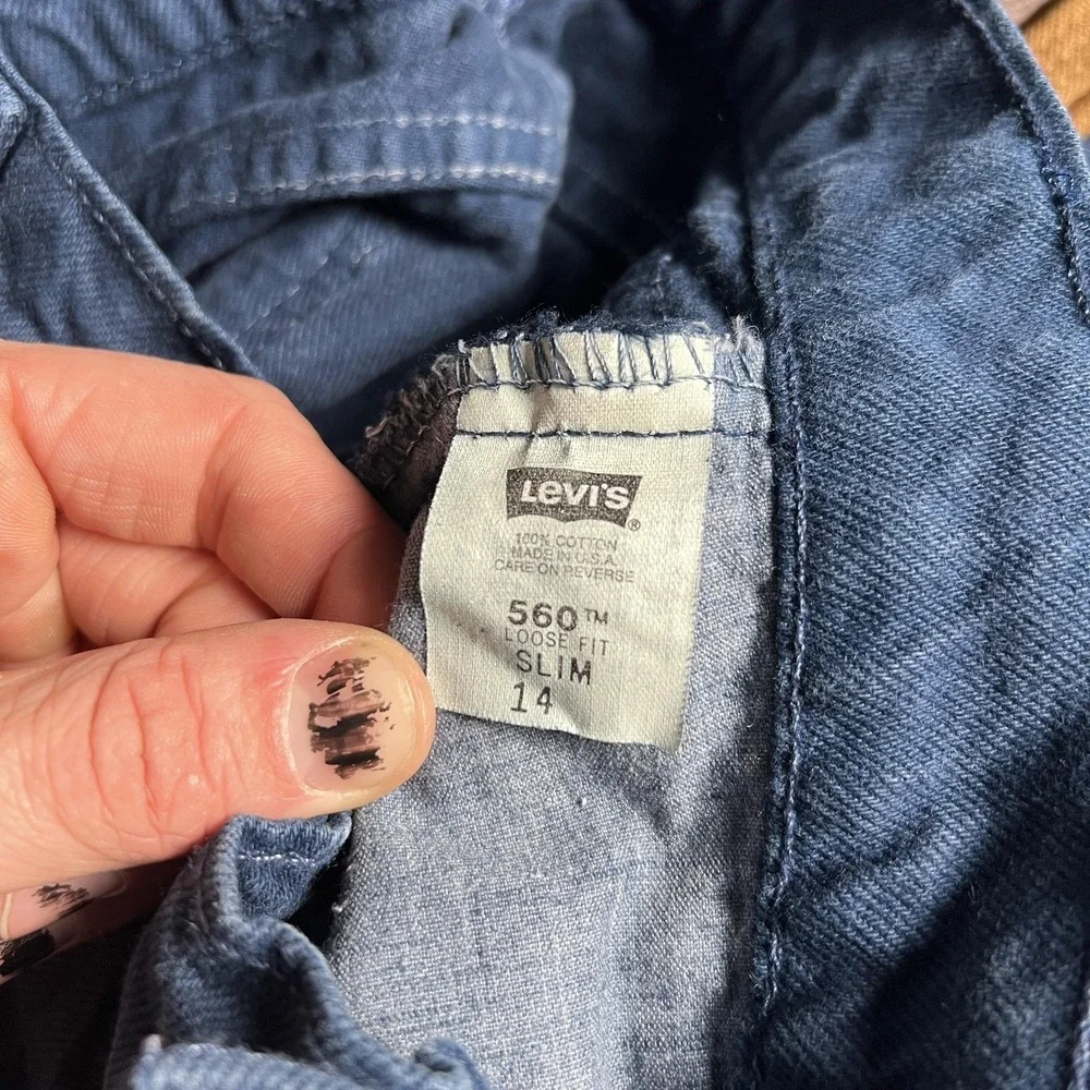 VTG Levi's 560‎ Orange Tab Jeans Boys 14 Slim 24x27 Blue Loose Fit Made USA 90s